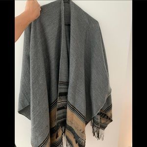 Gray poncho with detail